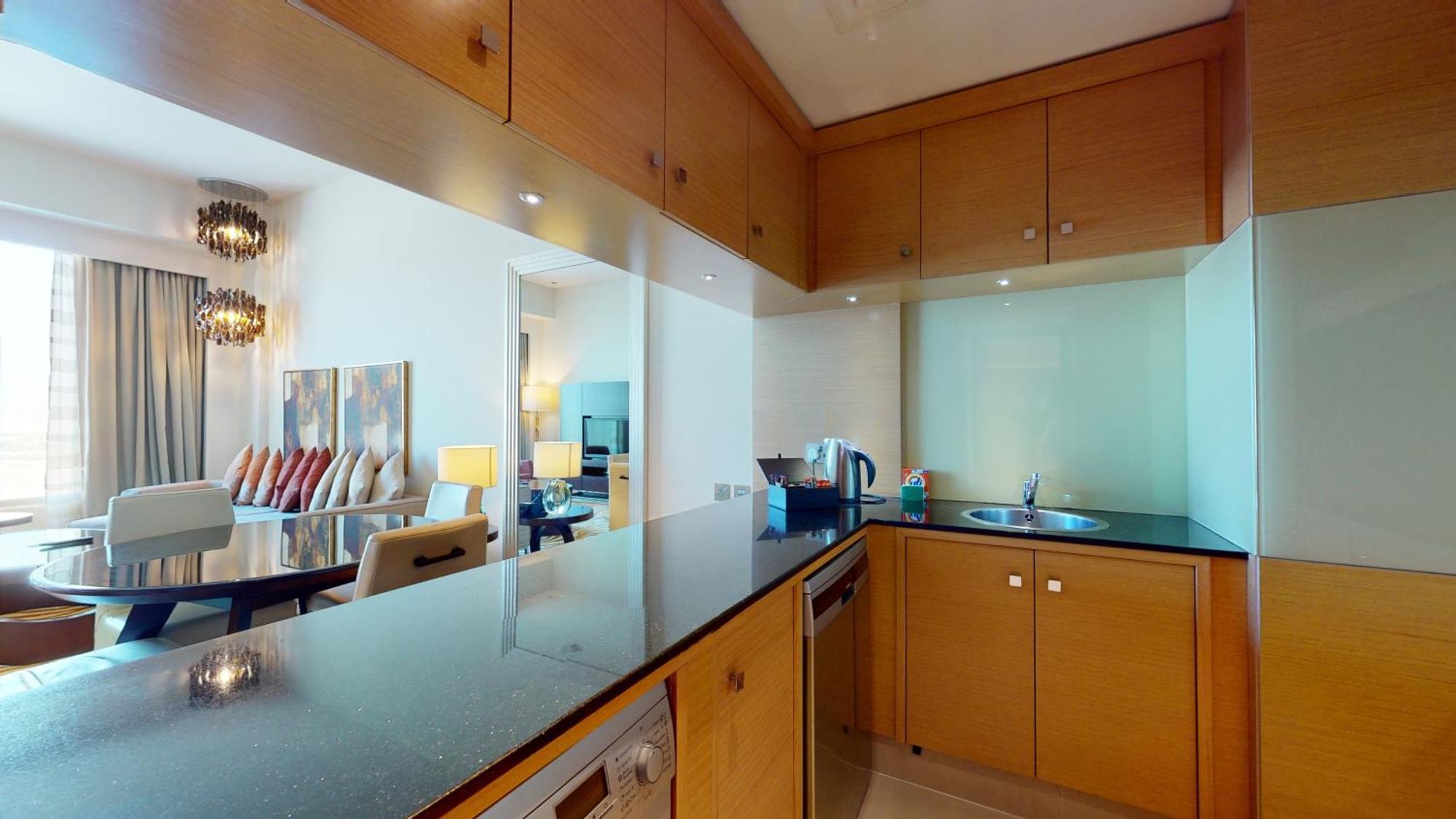 マリオット エグゼクティブ アパートメンツ ドバイ アル ジャダフ エクステリア 写真 A kitchen in a serviced apartment